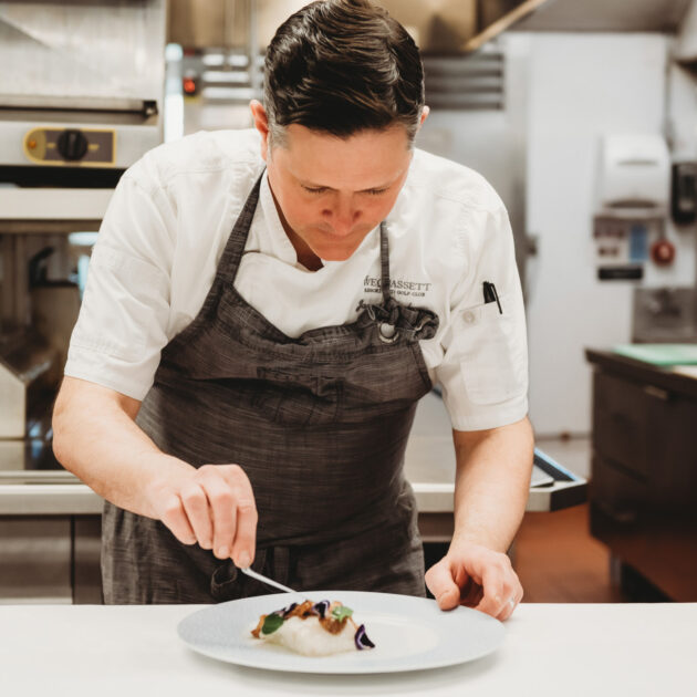 Chef with plate.